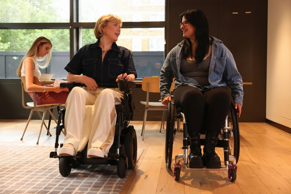 Two disabled women on wheelchair